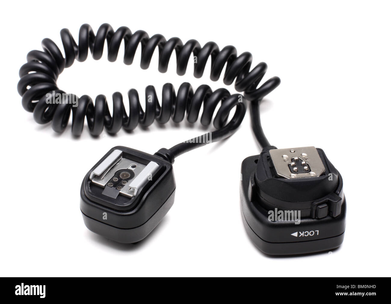 Offcamera shoe cord for connection to flash, isolated on white Stock