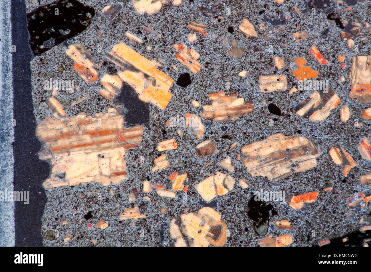 Photomicrograph of Andesite from Montserrat, the Soufriere volcano. Stock Photo