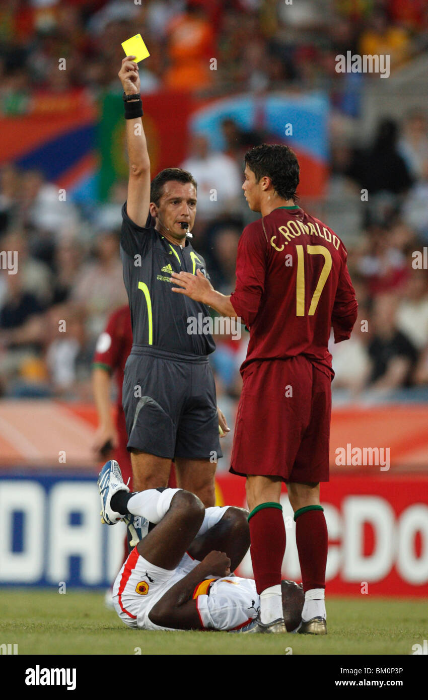 Cristiano Ronaldo of Portugal (17) is shown a yellow card caution by referee Jorge Larriondo during a 2006 World Cup match. Stock Photo