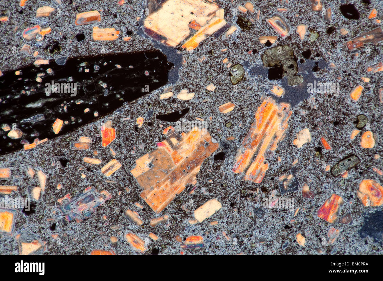 Photomicrograph of Andesite from Montserrat, the Soufriere volcano. Stock Photo