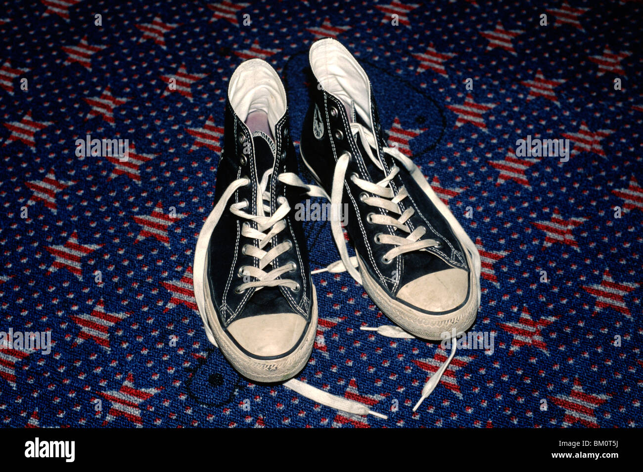 Converse Chucks on a star-patterned floor Stock Photo - Alamy