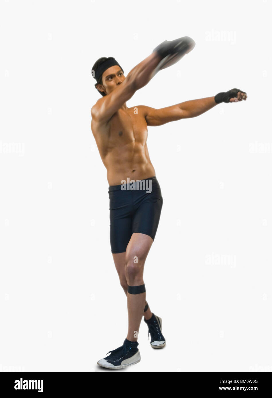Athlete throwing a discuss Stock Photo Alamy