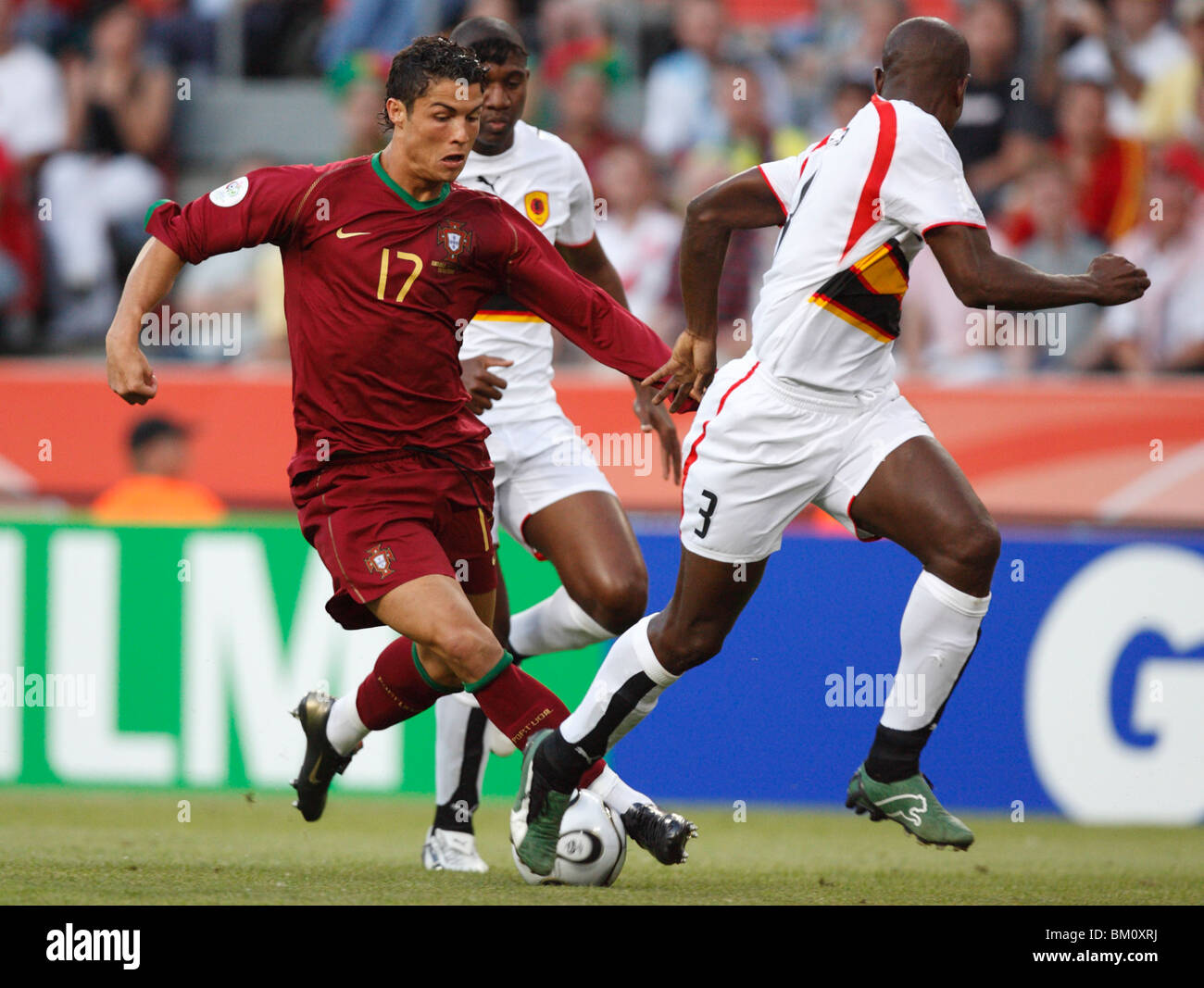 Cristiano Ronaldo of Portugal drives the ball during a FIFA World Cup soccer match against Angola June 11, 2006. Stock Photo