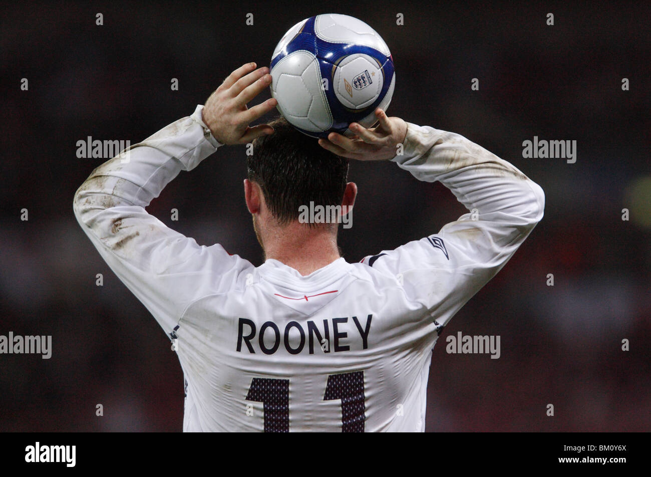 Wayne Rooney of England prepares a throw in during an international friendly against the USA at Wembley Stadium. Stock Photo