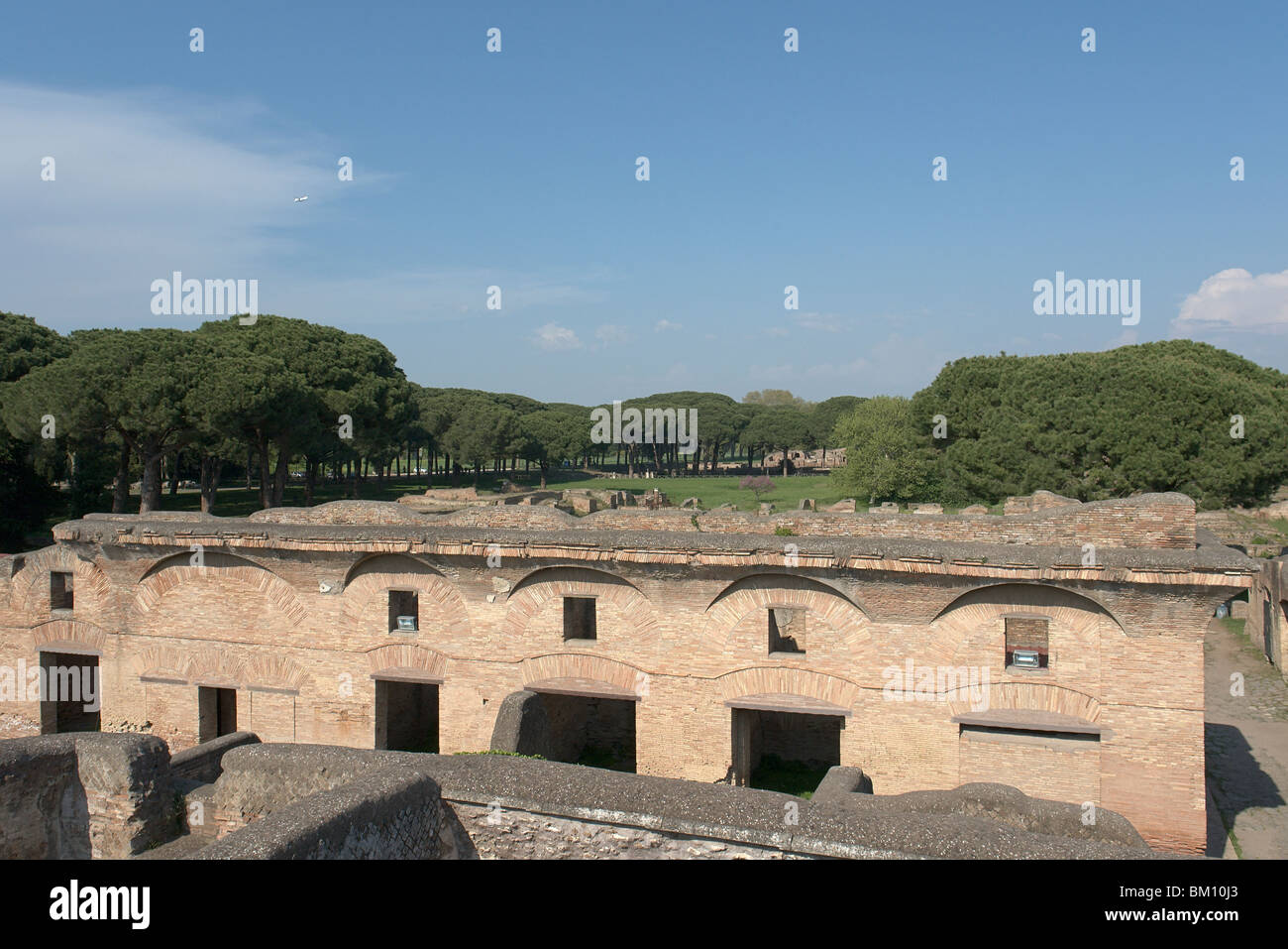 Ostia Antica, Rome. View of the Caseggiato di Diana (Tenement of Diana), an 'apartment builiding' with shops at the ground floor. Stock Photo