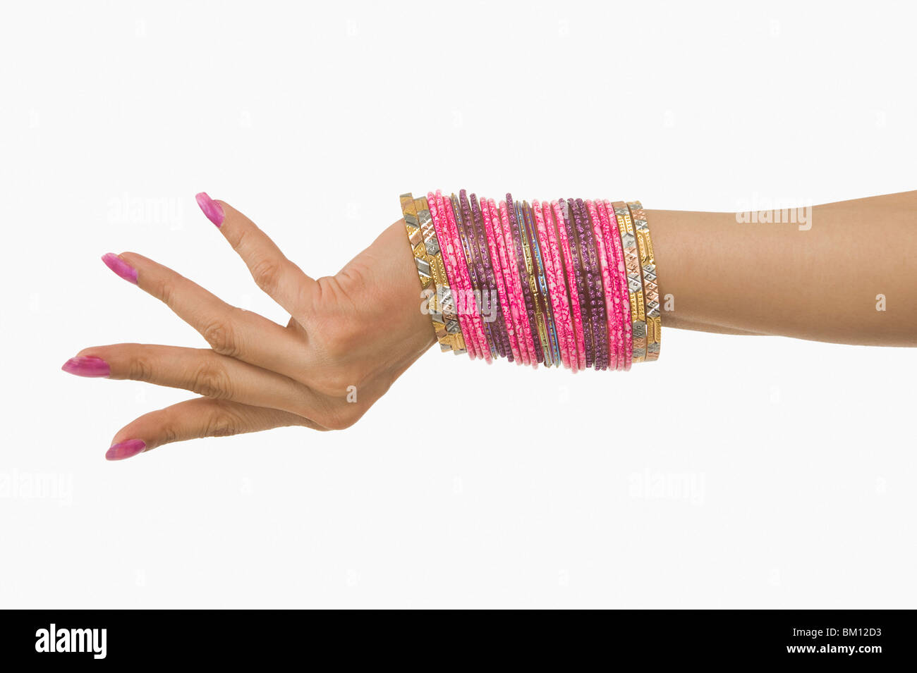 Woman's hand with bangles Stock Photo