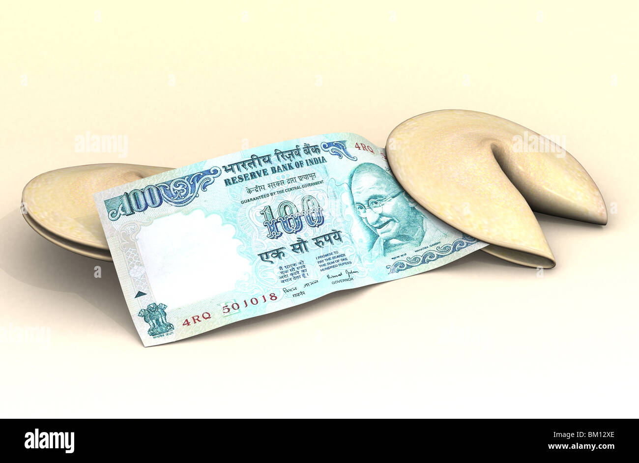 Fortune cookies with one hundred rupee banknote Stock Photo