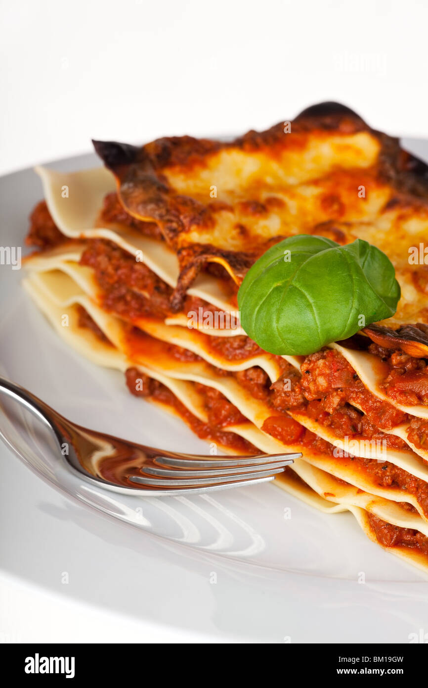 lasagna noodle dish on a white plate Stock Photo