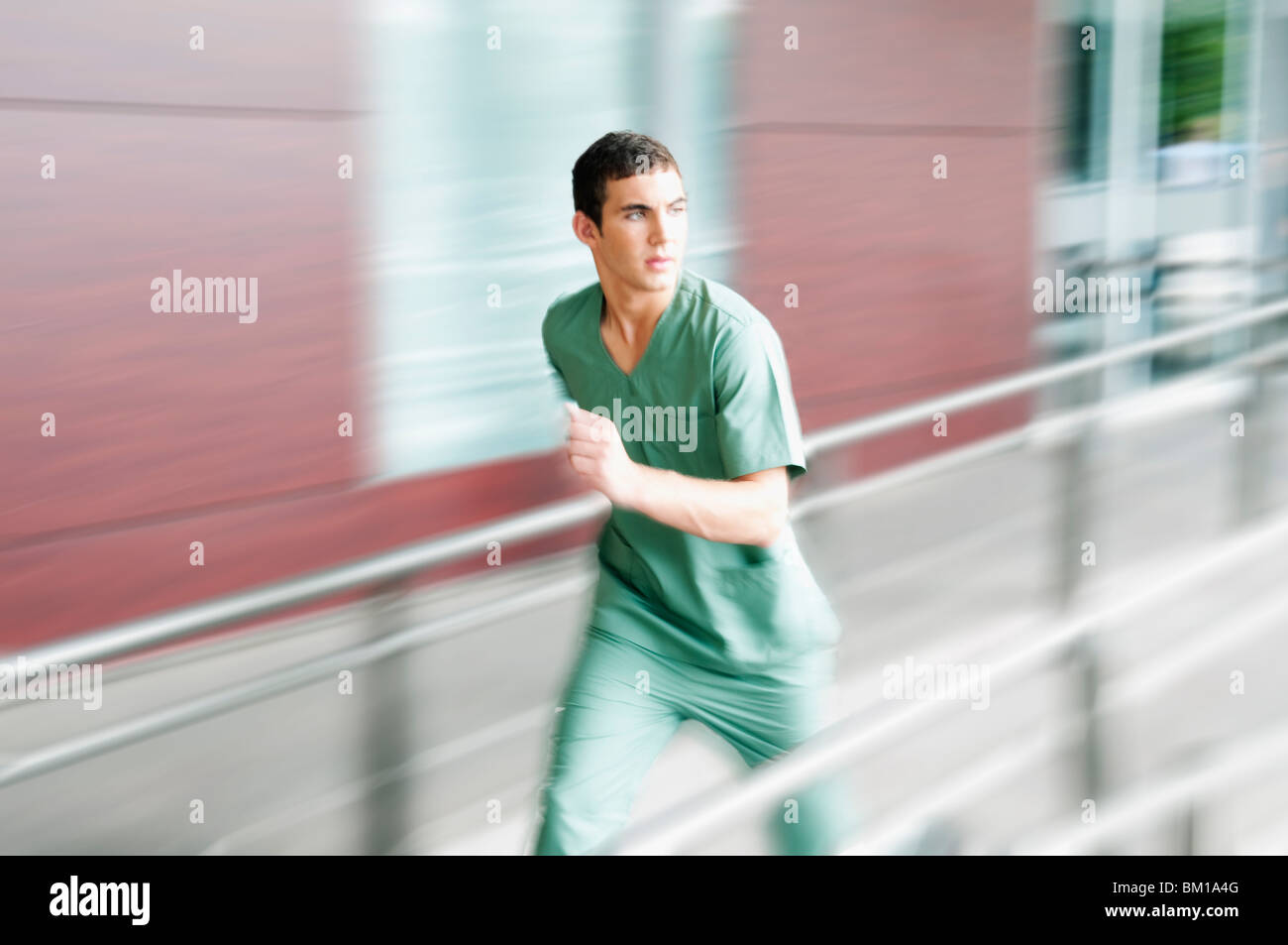 Male nurse running in a hospital Stock Photo Alamy