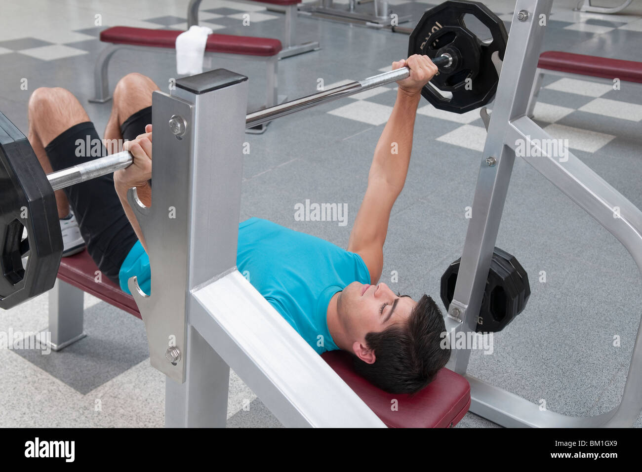 Man exercising in a gym Stock Photo
