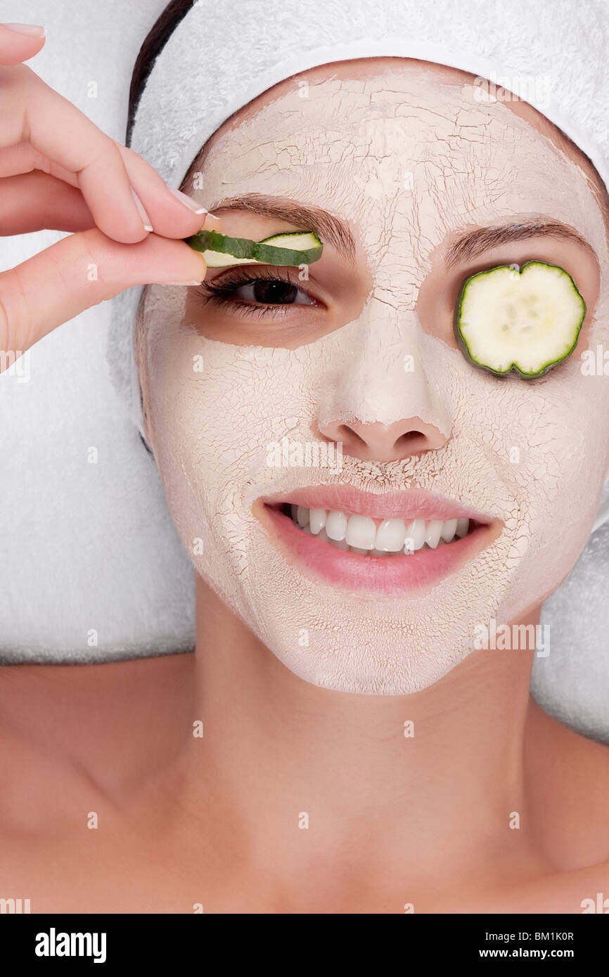 Cucumber slices on a woman's eyes Stock Photo Alamy