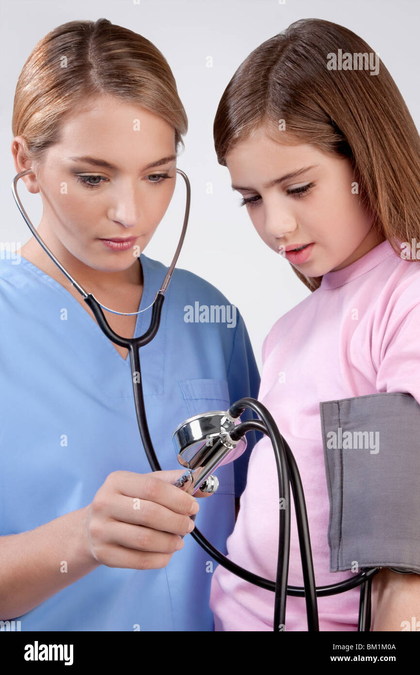 Nurse Checking Blood Pressure Child High Resolution Stock Photography ...