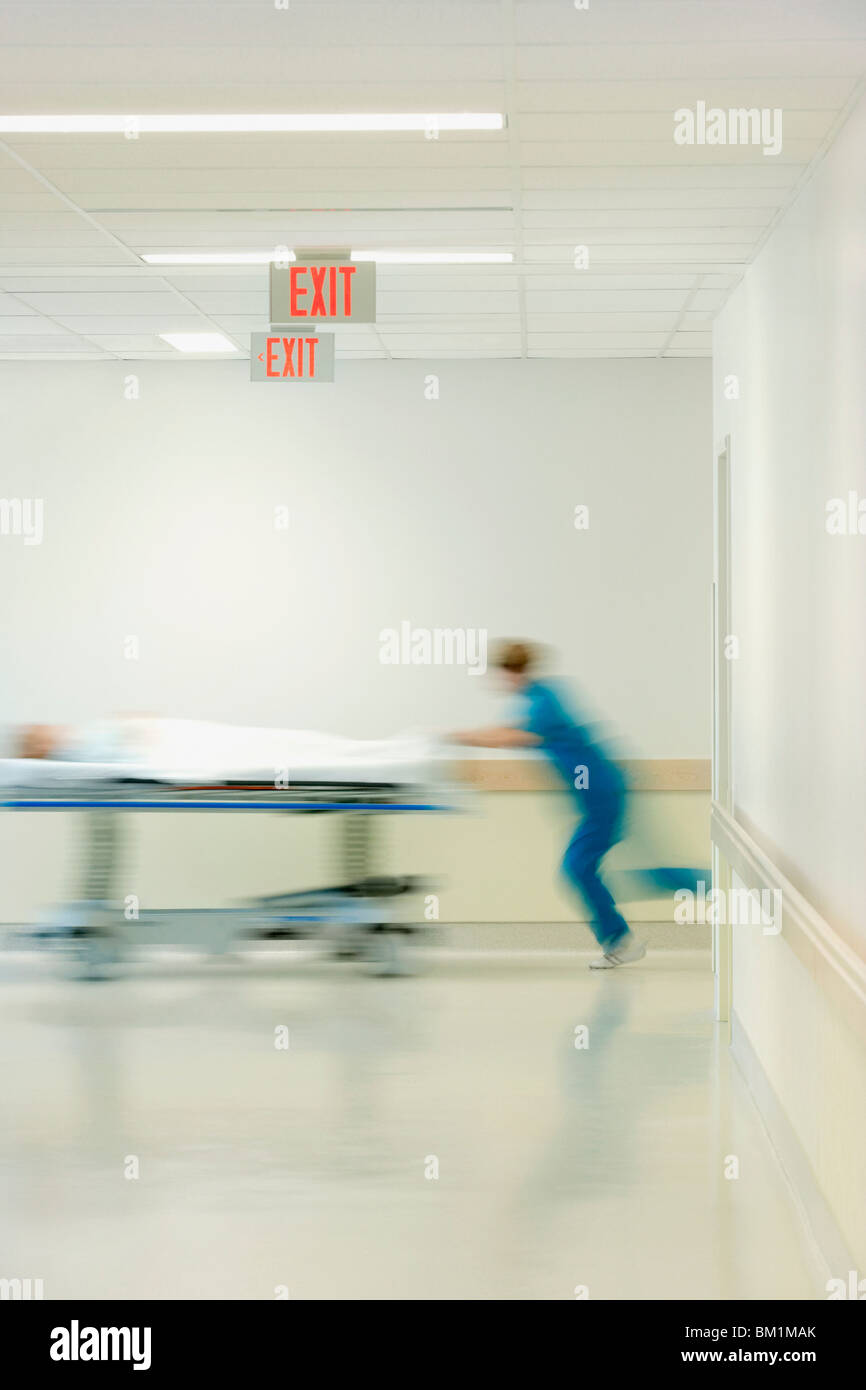 Doctor Rushing Patient In Doctor getting down work hi-res stock photography and images - Alamy