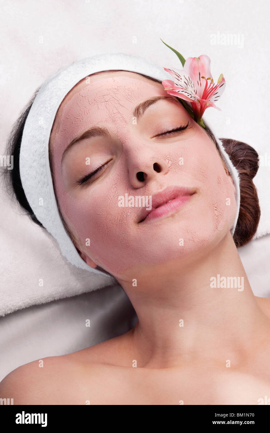 Woman receiving facial treatment Stock Photo