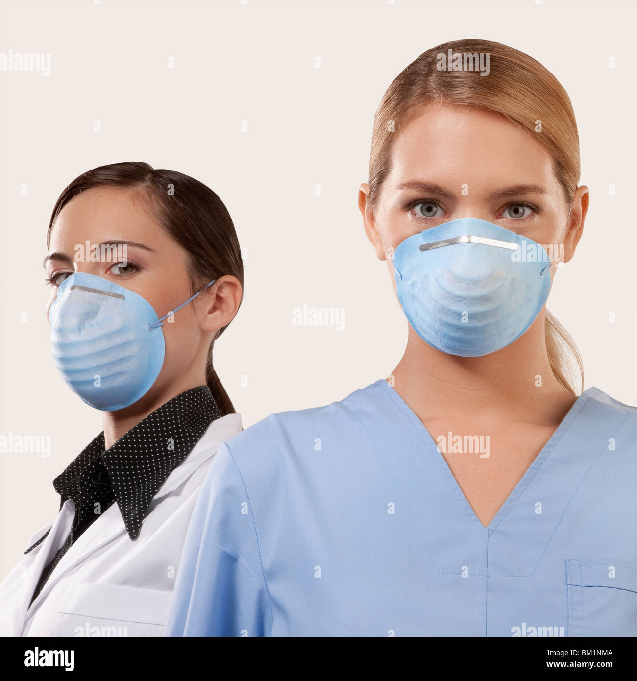 Portrait of two female doctors wearing flu masks Stock Photo Alamy