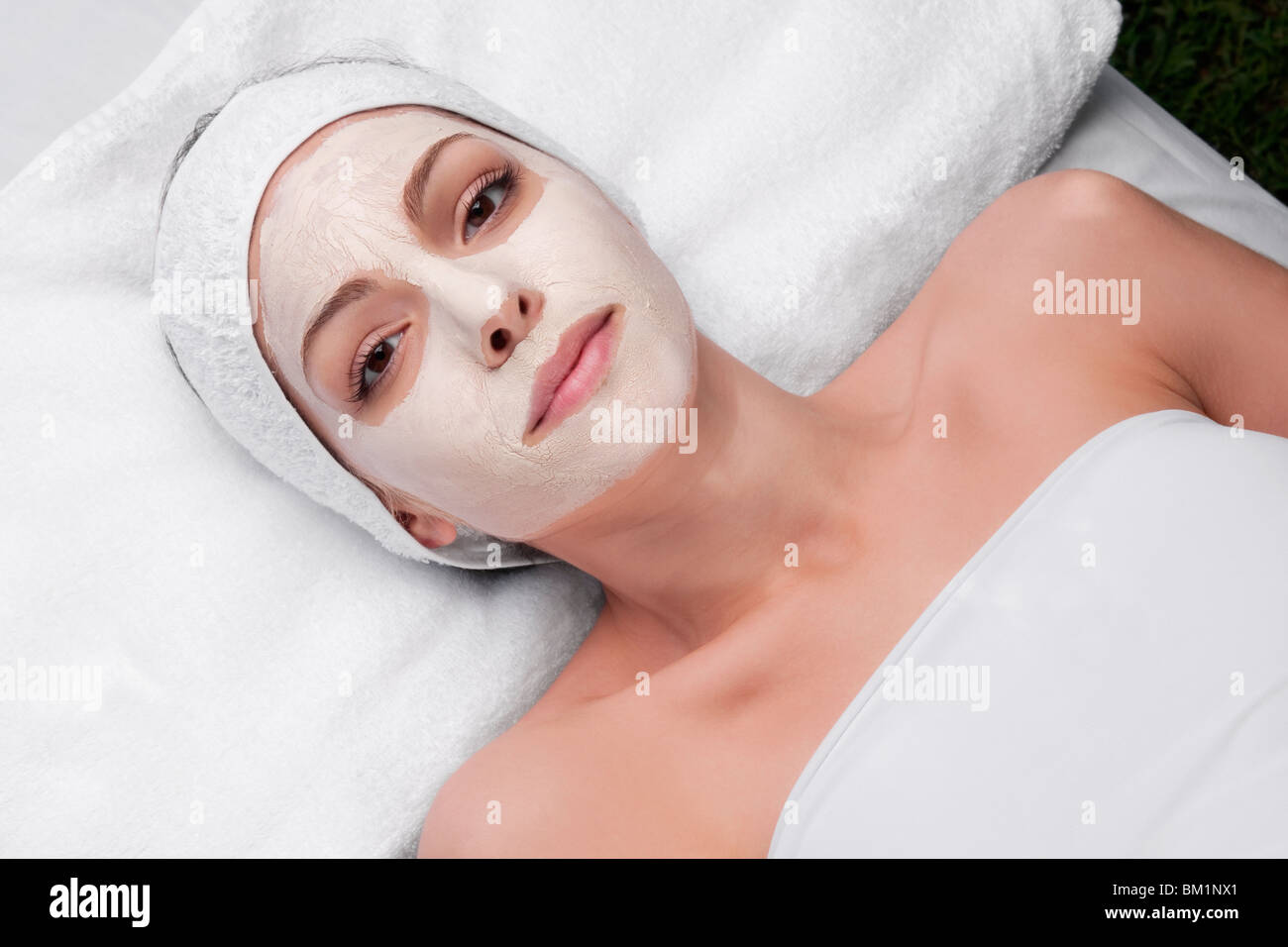 Woman receiving facial treatment Stock Photo