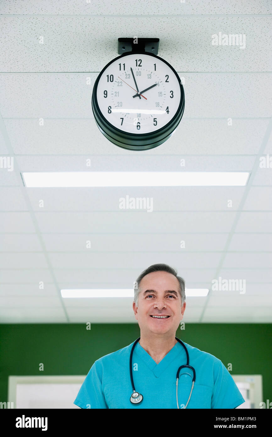 Portrait of a surgeon smiling Stock Photo - Alamy