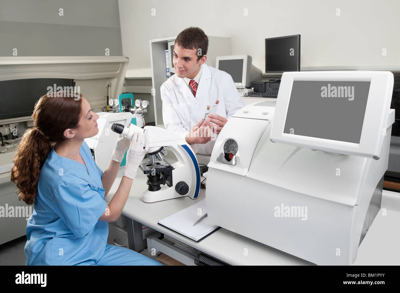 Lab technicians working in a laboratory Stock Photo