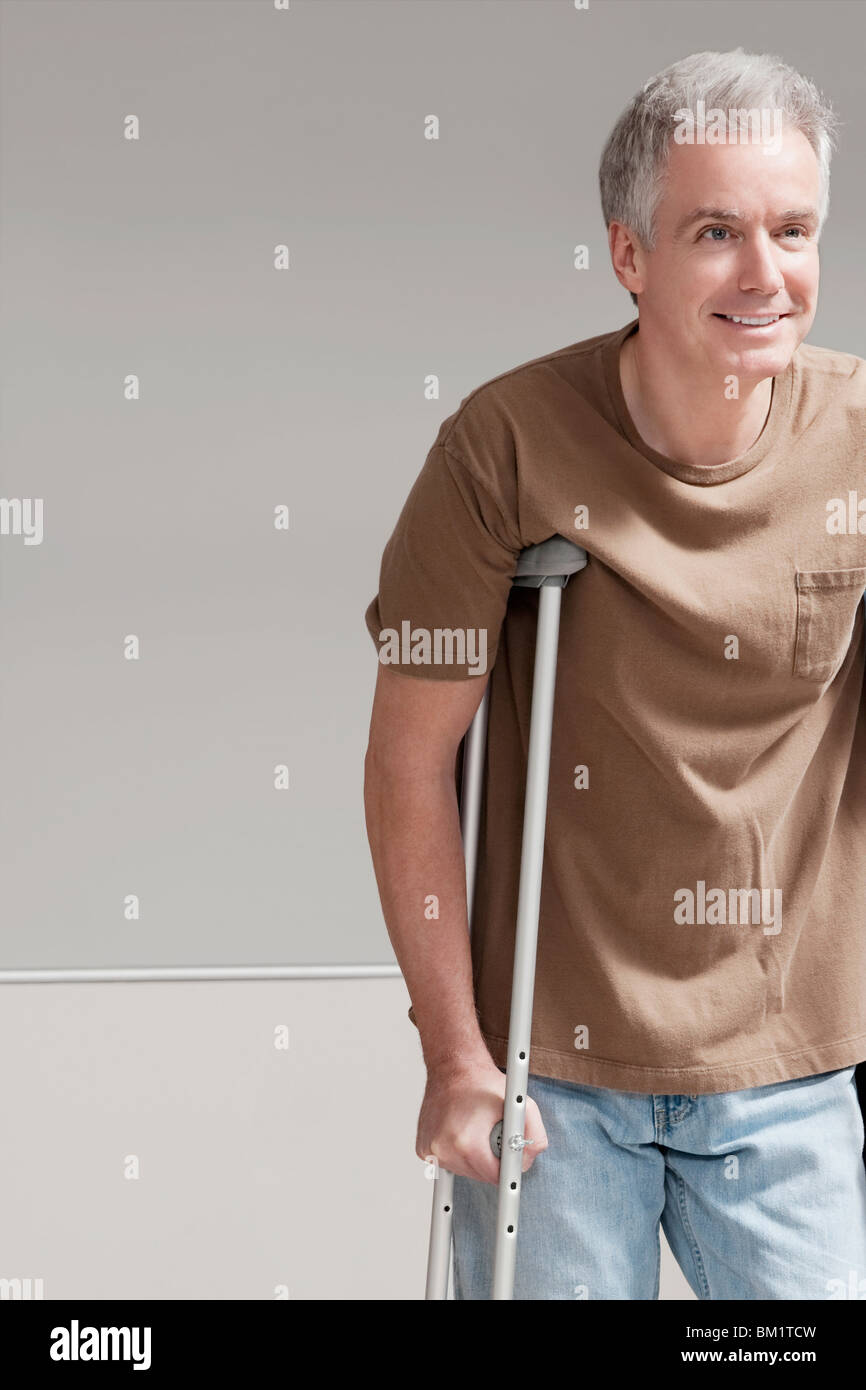 Patient walking with the help of crutches Stock Photo Alamy