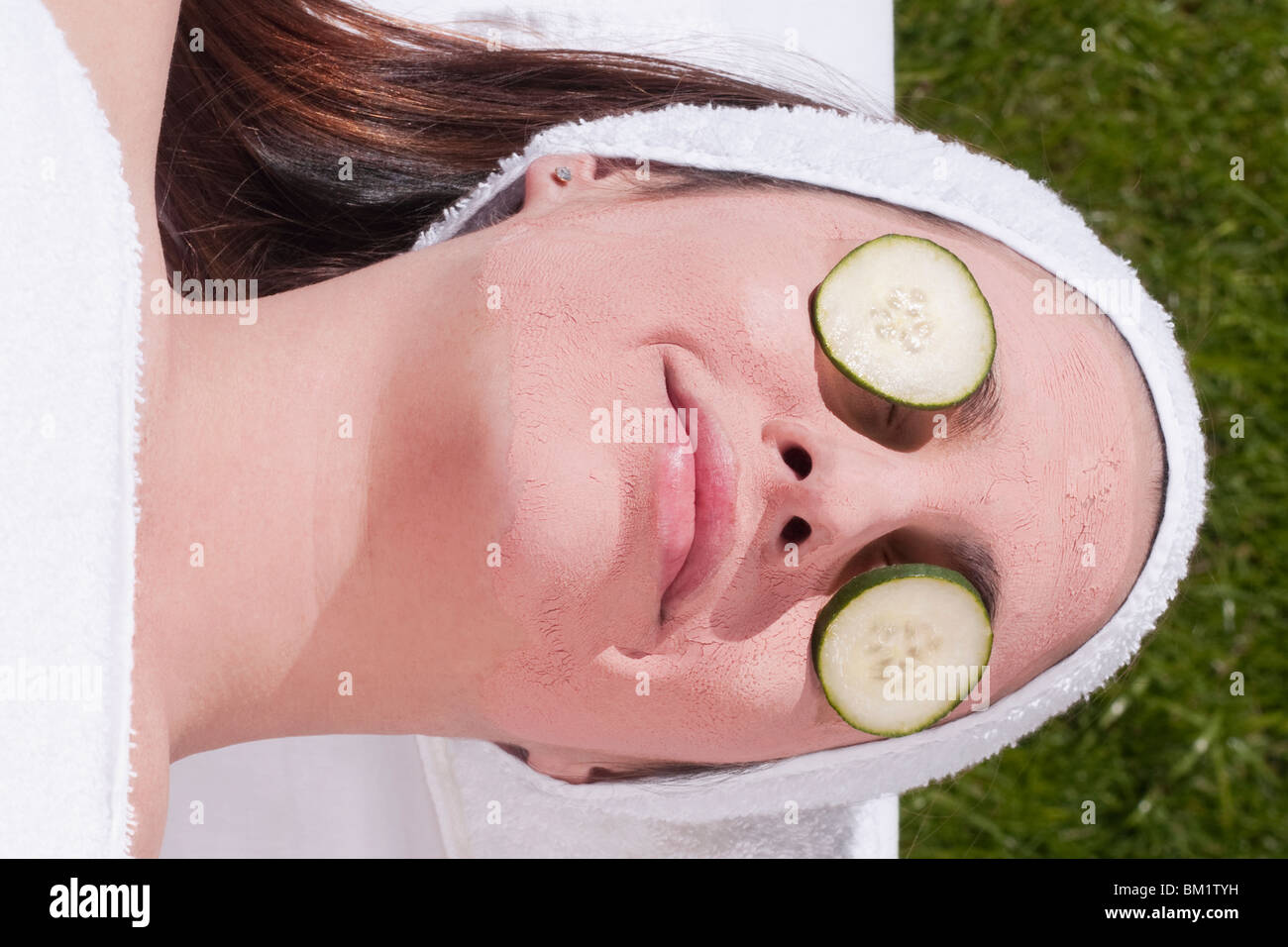 Cucumber slices on a woman's eyes Stock Photo Alamy