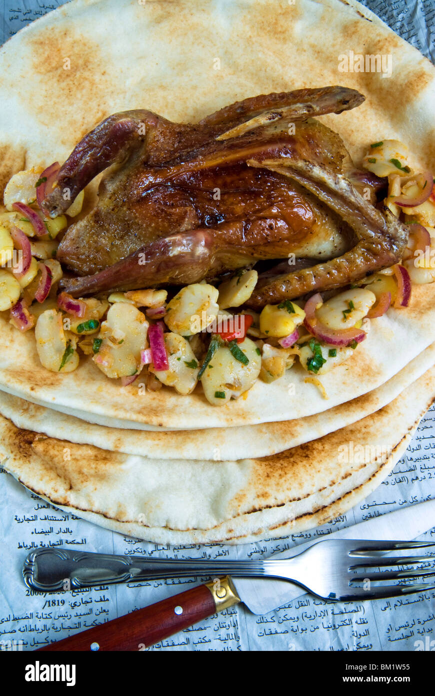Egyptian roasted pigeon, Middle Eastern food, Egypt, North Africa, Africa Stock Photo