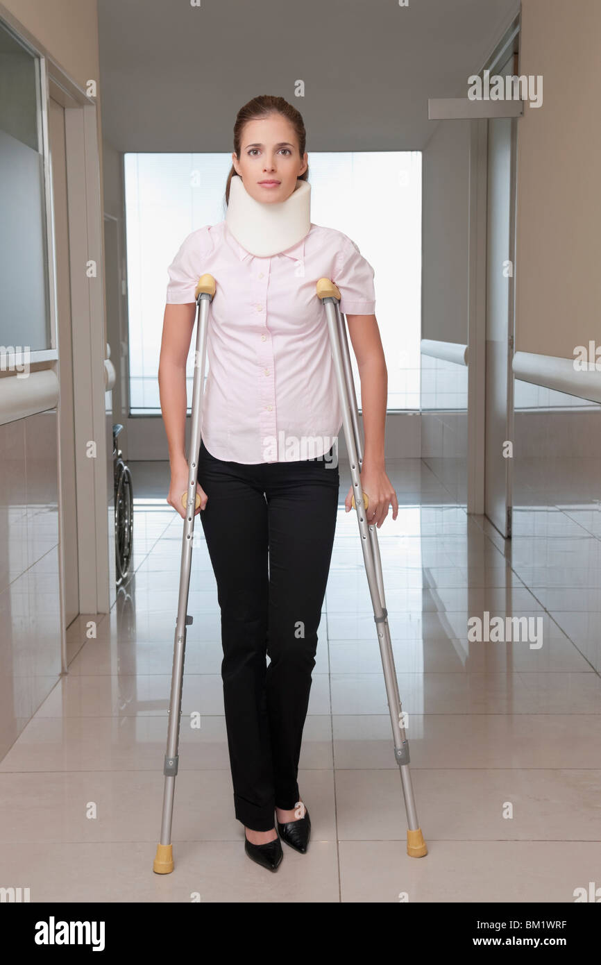 Patient walking with the help of crutches Stock Photo Alamy