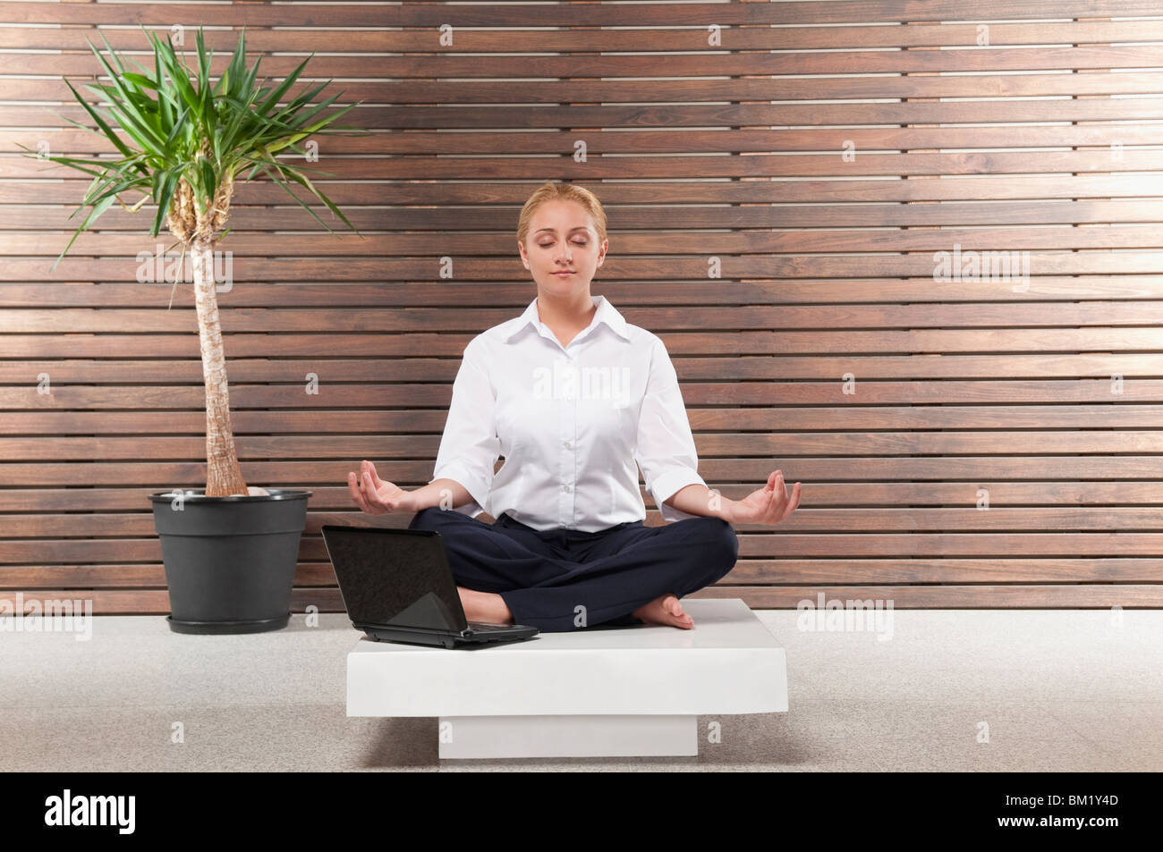 Businesswoman sitting on stool hi-res stock photography and images - Alamy