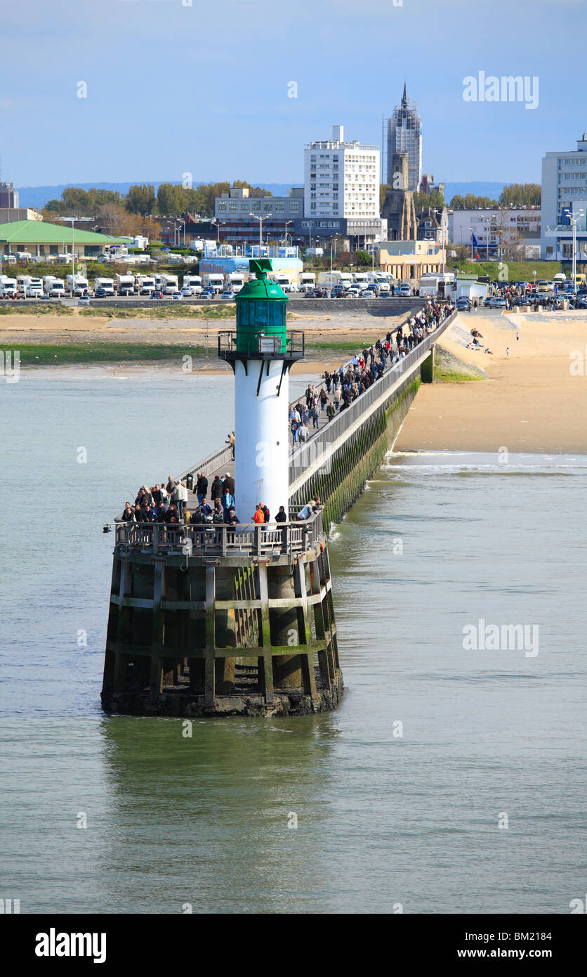Calais Harbour - fishing and walking on the pier. Stock Photo