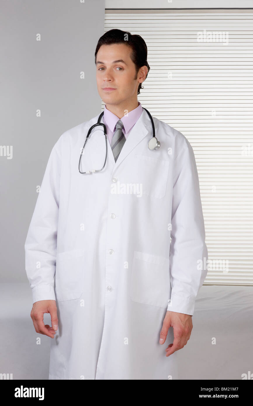 Doctor portrait standing hi-res stock photography and images - Alamy