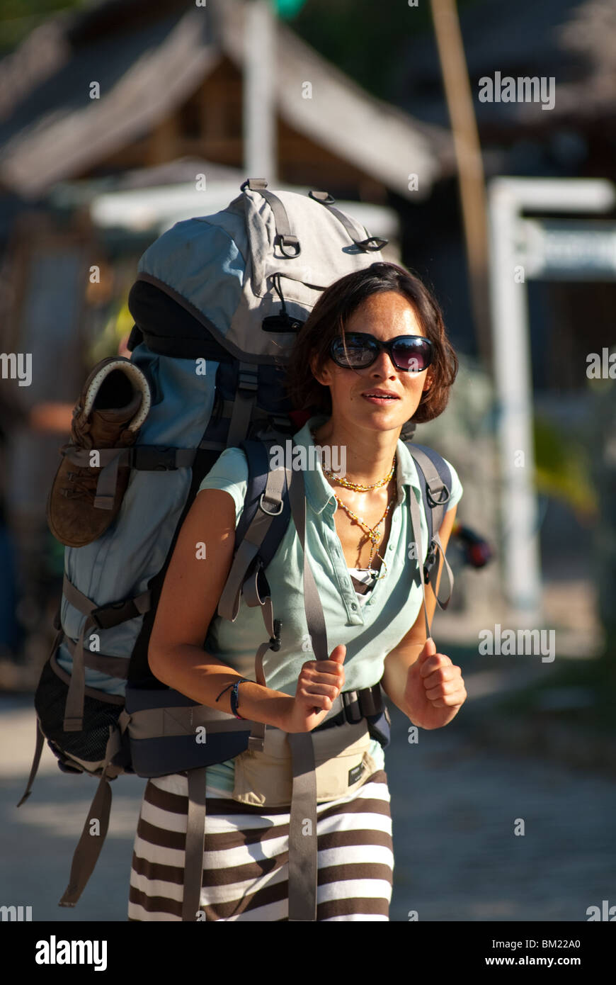Early wake up for a backpacker ready to reach her next destination ...
