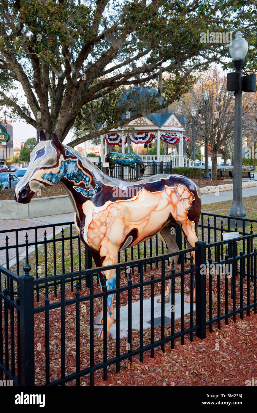 Ocala, FL - Mar 2009 - Painted horse sculptures and gazebo with bunting decorate the downtown square in Ocala, Florida Stock Photo