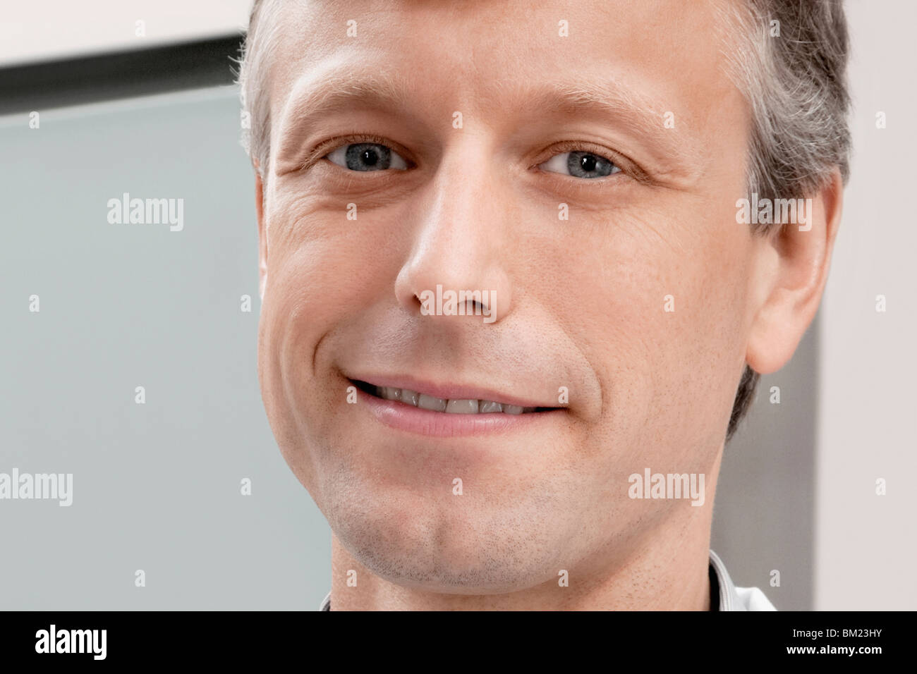 Portrait of a doctor smiling Stock Photo - Alamy