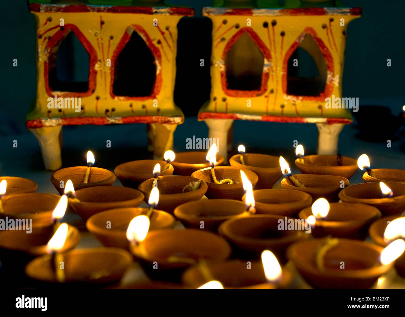 Diwali deepak lights (oil and cotton wick candles) and shrine decorations, India, Asia Stock Photo