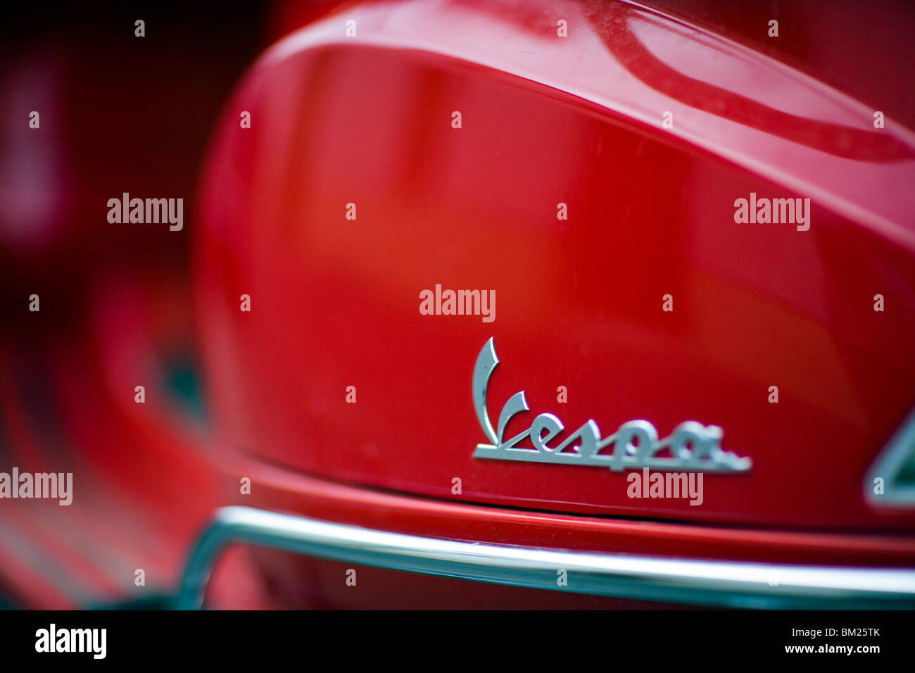 The Vespa brand logo from a red scooter, Seville, Spain Stock Photo