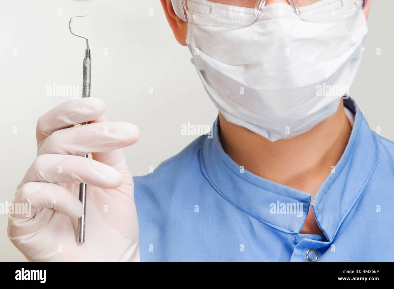 Closeup of a female dentist holding a dental scaler Stock Photo Alamy