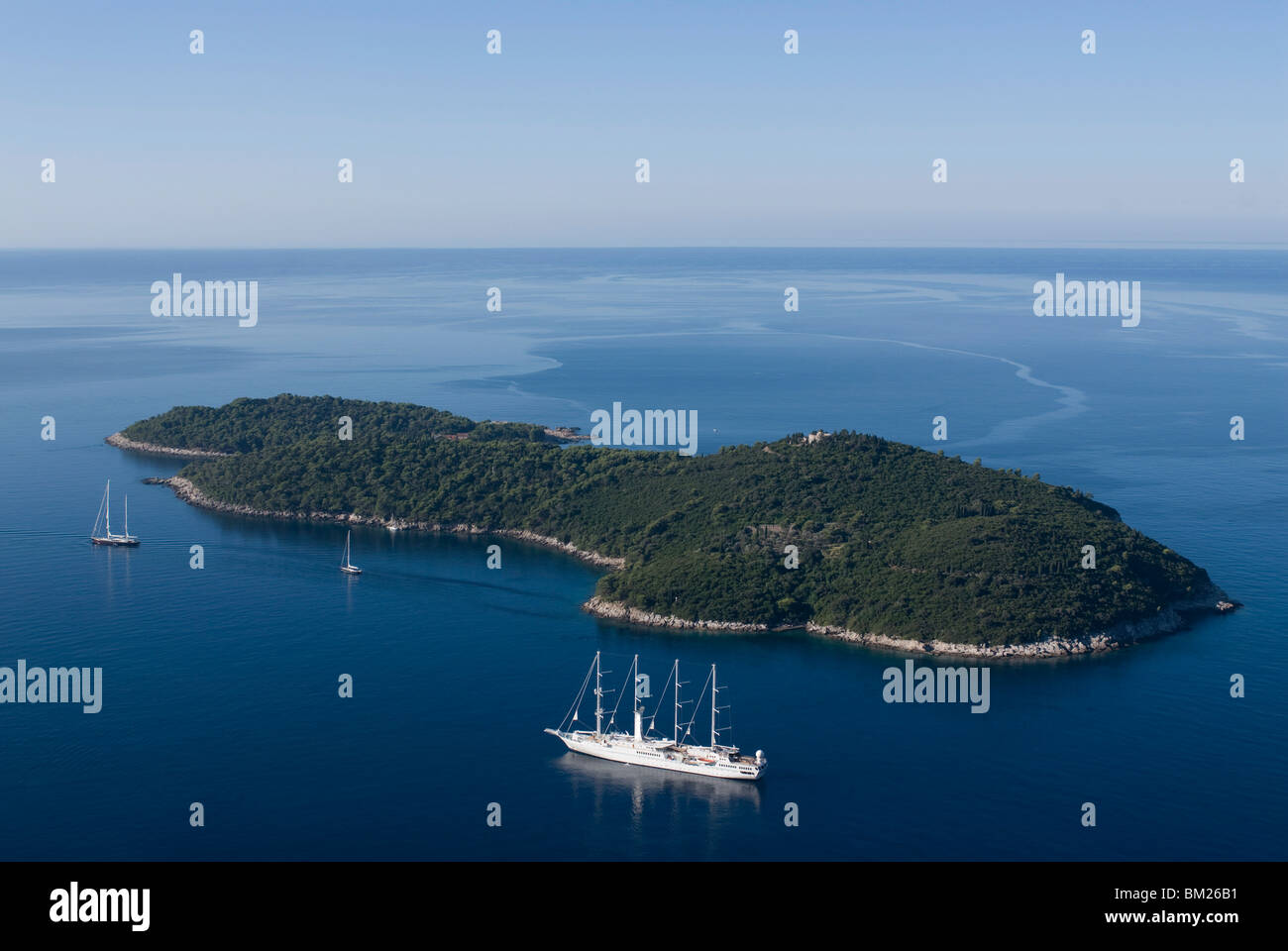 Yacht sailing round the island of Lokrum, part of the Elaphite Islands
