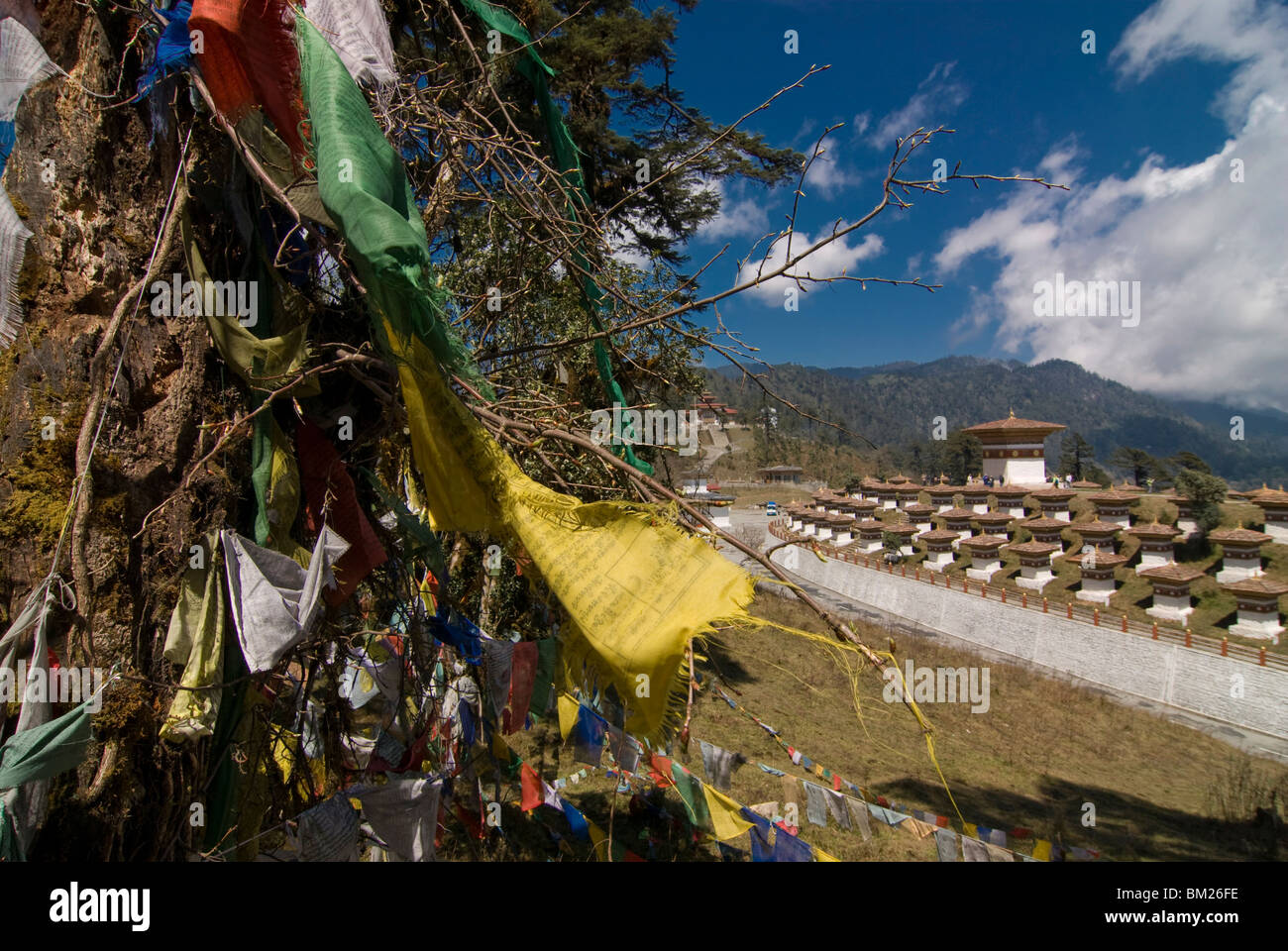 Prayer flags on top of the Dochu La mountain pass, Bhutan Stock Photo