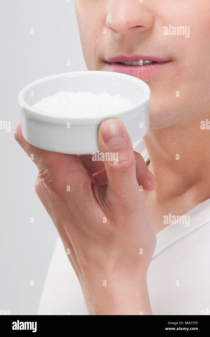 Man smelling bath salt Stock Photo Alamy
