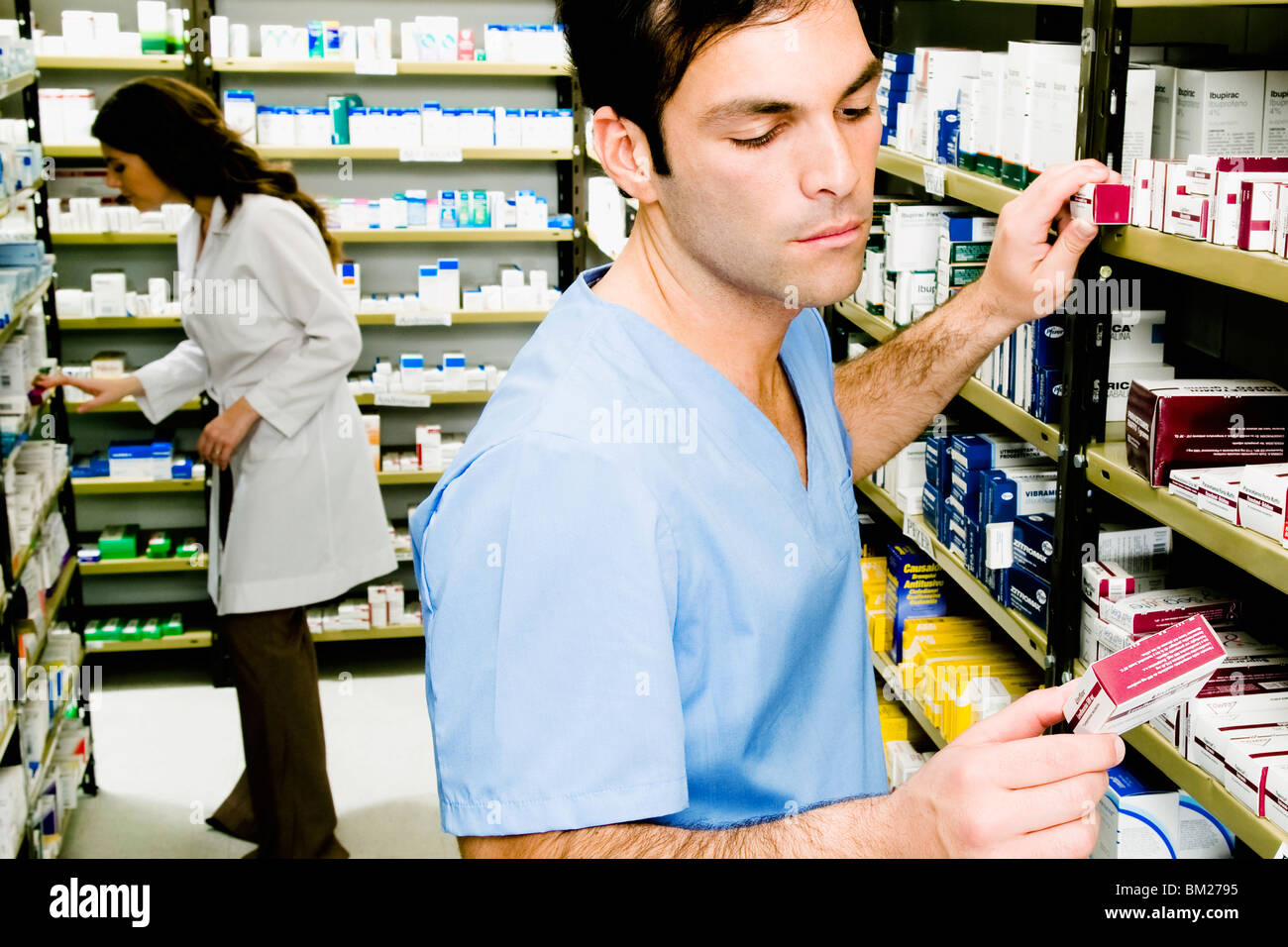 Two pharmacists in a pharmacy Stock Photo