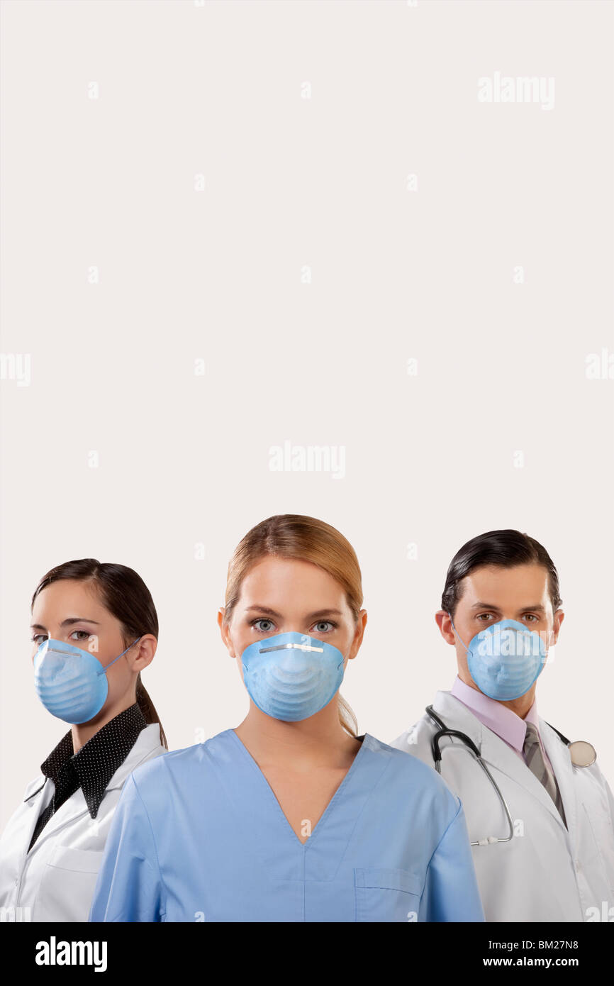 Doctors wearing flu masks Stock Photo Alamy