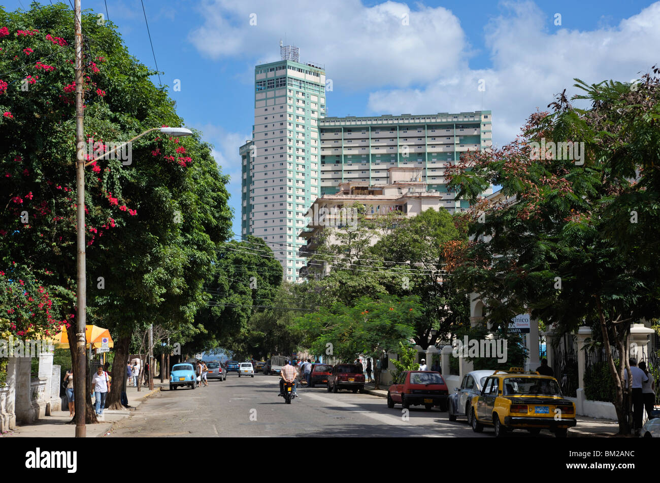 Calle 17 (17th Street) leading to the Focsa Building built in 1956, Vedado, Havana, Cuba, West Indies Stock Photo