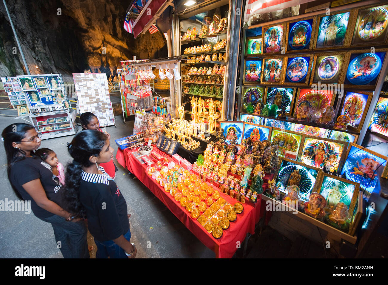 Indian tourists looking at souvenirs in Batu Caves, Kuala Lumpur, Malaysia, Southeast Asia Stock Photo