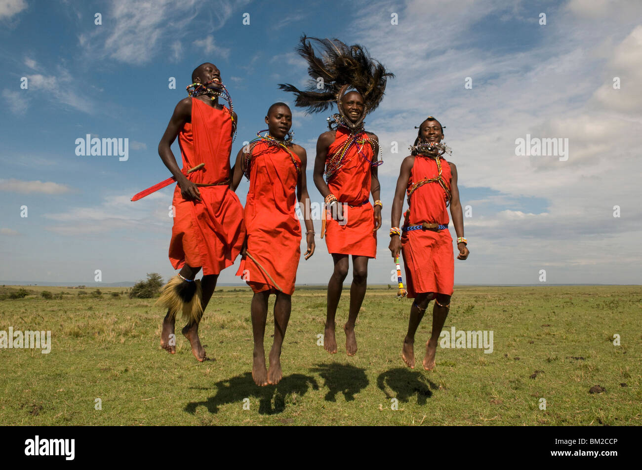 Masai performing warrior dance, Masai Mara, Kenya, East Africa Stock Photo