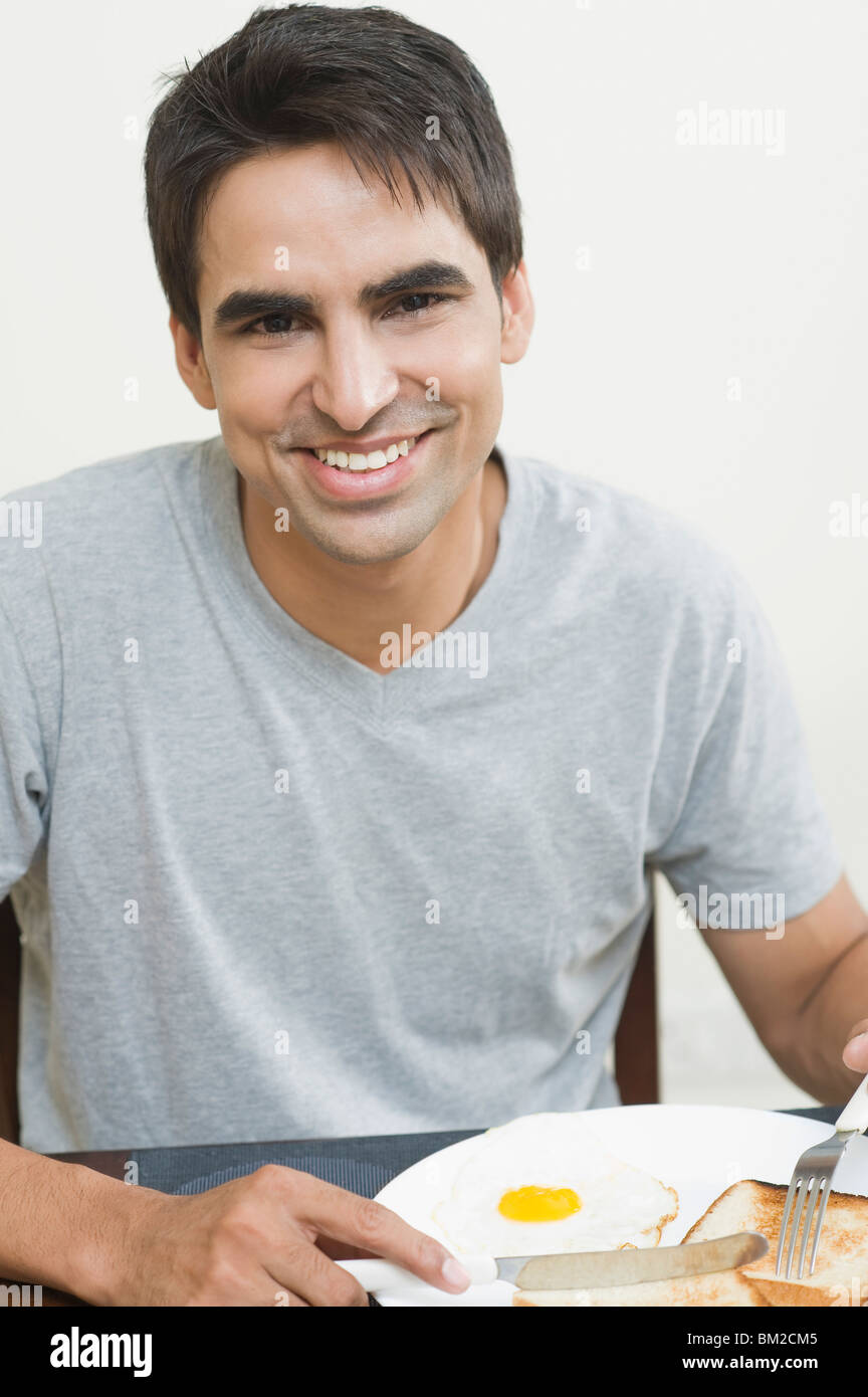 Portrait happy man knife fork hi-res stock photography and images - Alamy