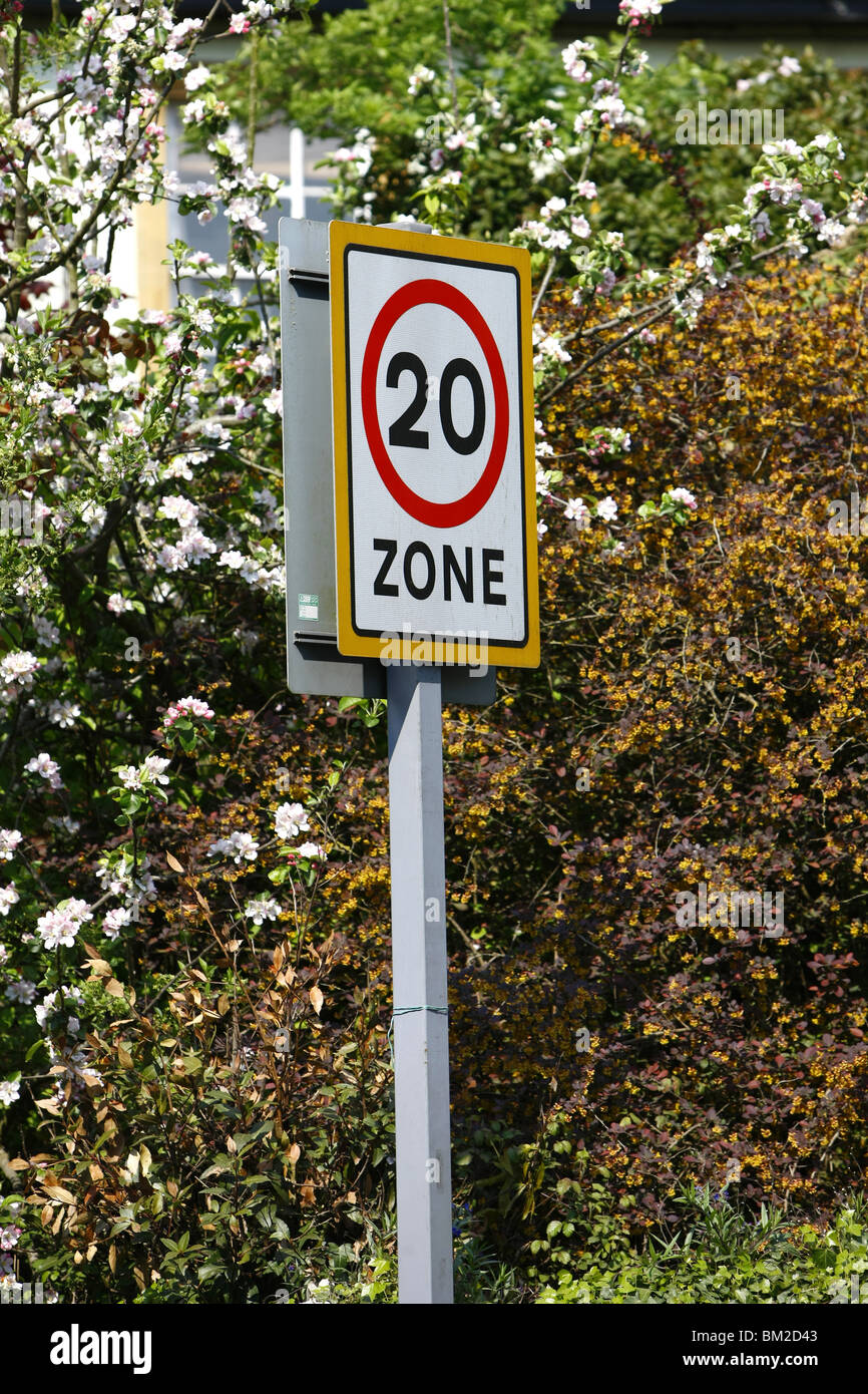 A 20mph zone road sign in a school area of a town the new speed limit