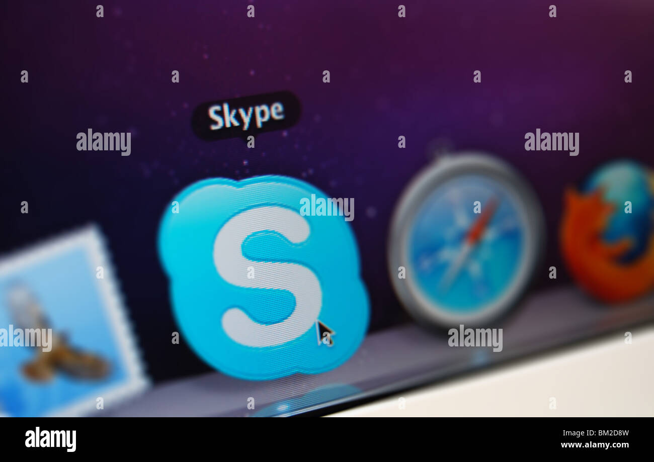 A Photo illustration of the Skype application in the dock of a macbook Stock Photo