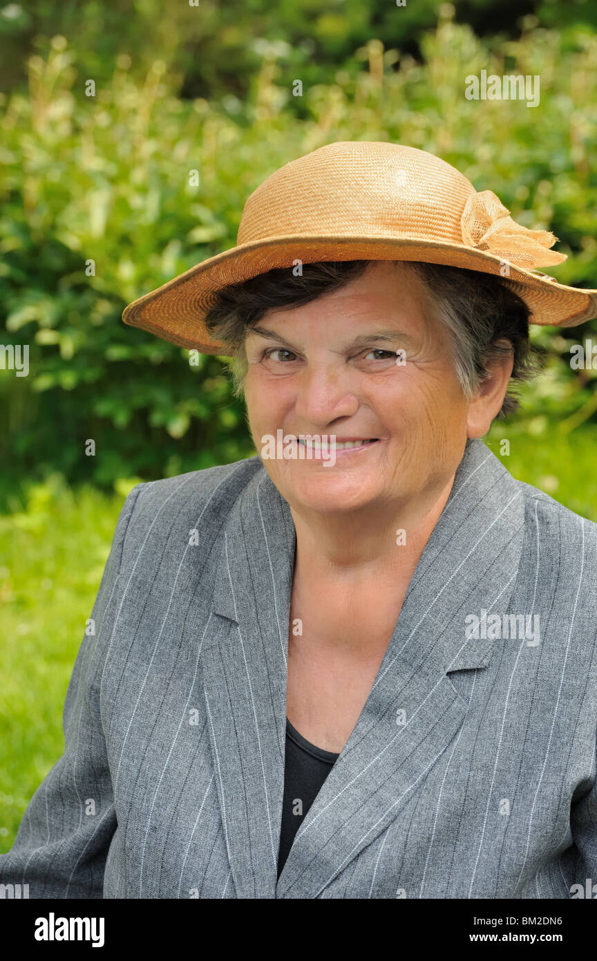 Senior woman smiling - portrait - outdoor Stock Photo - Alamy