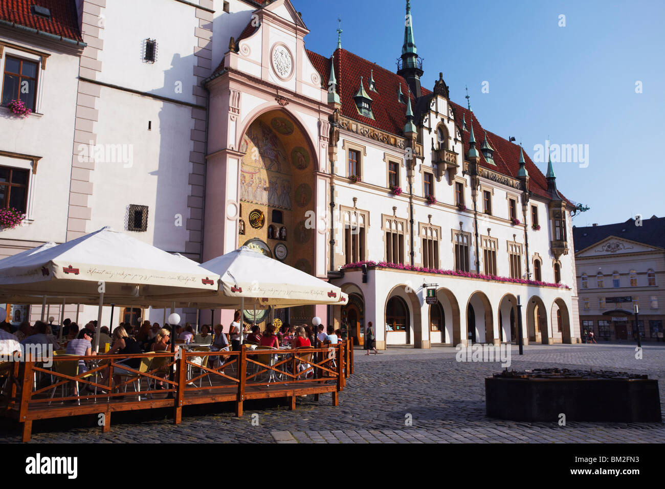 Outdoor cafe in front of Town Hall in Upper Square (Horni Namesti), Olomouc, Moravia, Czech Republic Stock Photo