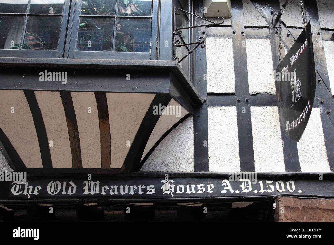 Sign on the Old Weaver's House and restaurant High Street Cantebury Kent England Stock Photo