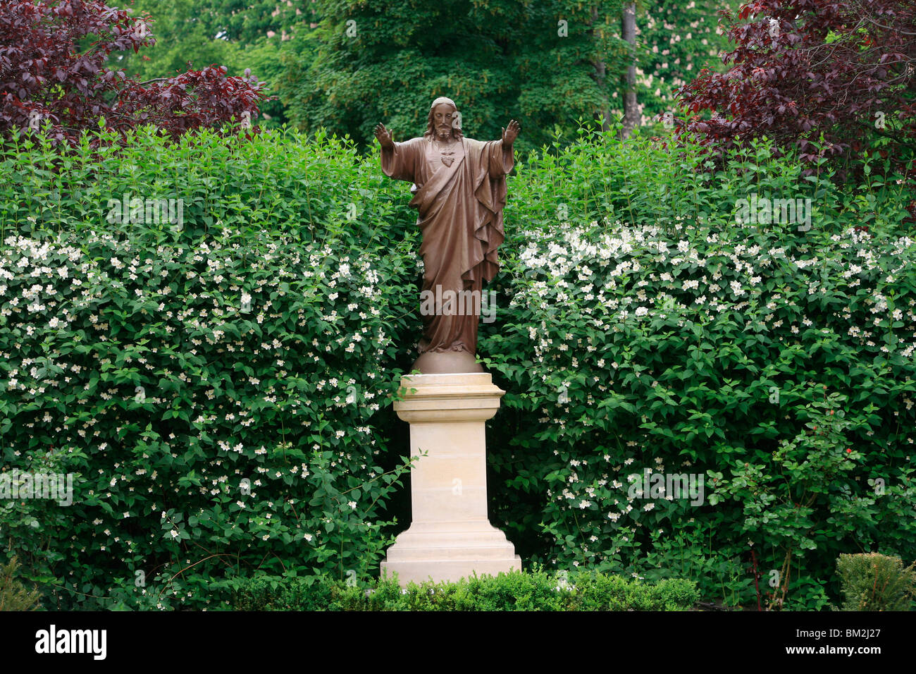 Sculpture in the Paris Foreign Missions HQ garden, Paris, France Stock Photo